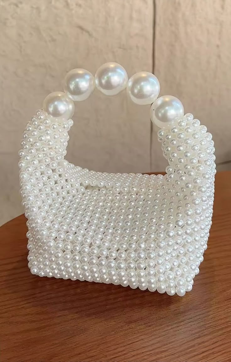 white pearl beaded crescent basket bag