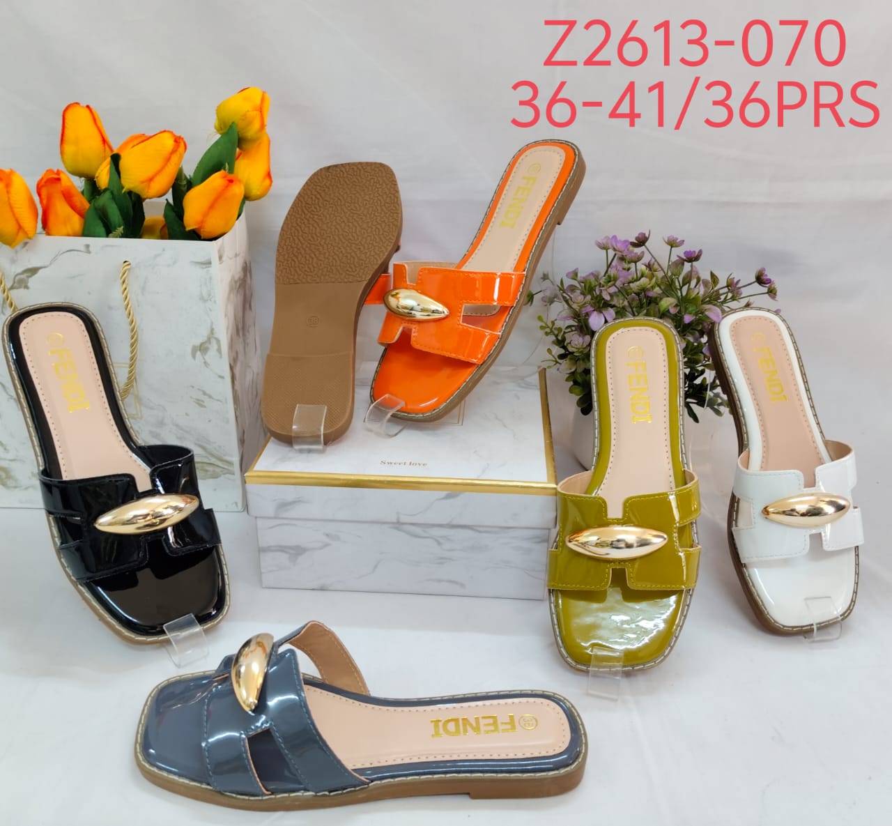womenβs flat cutout slide sandals.